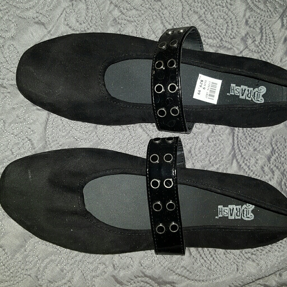 Black flats with strap detail